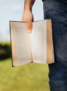 An image of an avatar teacher writing on a board